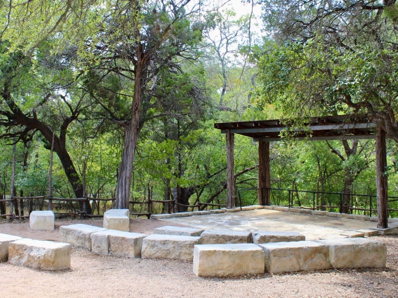a bench next to a tree
