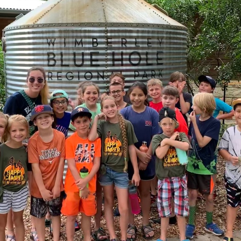 a group of people posing for a picture