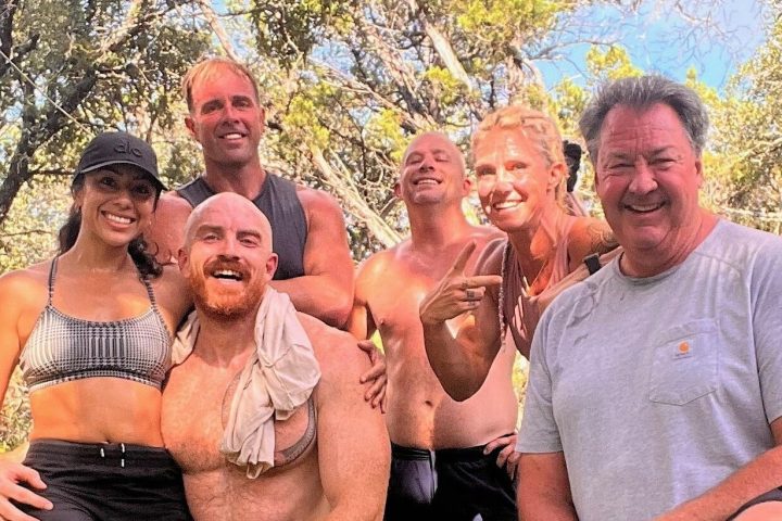 a group of people posing for the camera