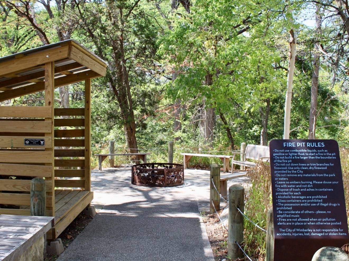 a wooden bench in front of a house