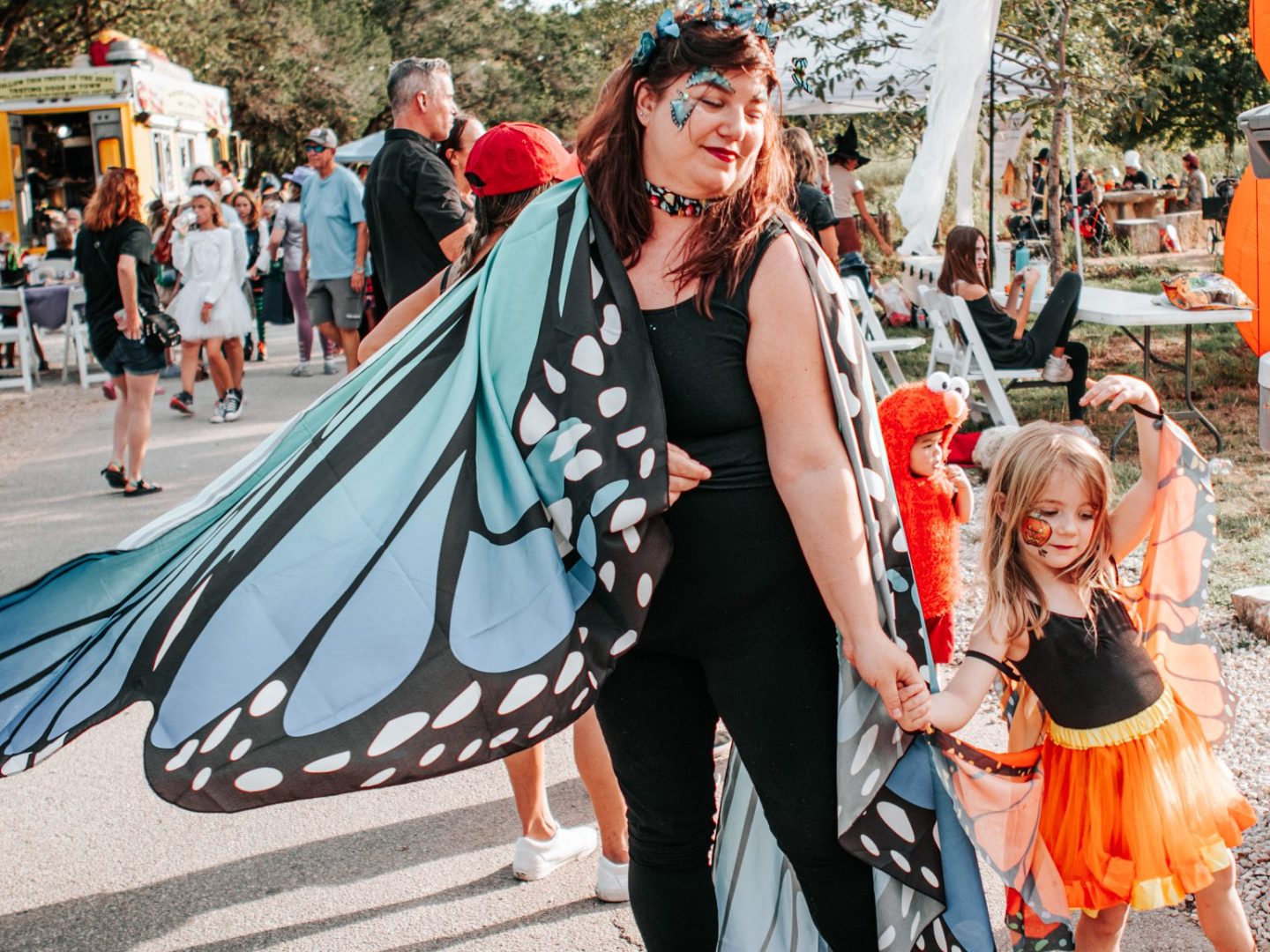 a group of people walking down the street