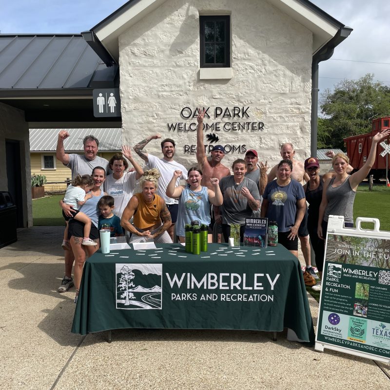 a group of people standing in front of a building
