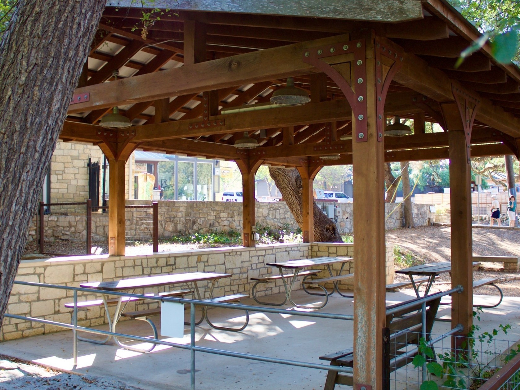 a wooden bench in front of a building