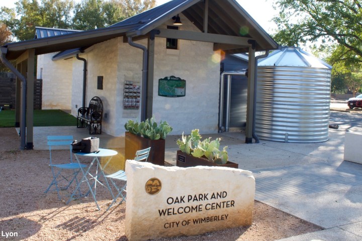 a house with trees in the background