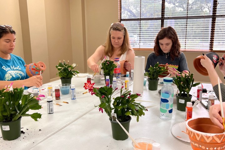 a group of people sitting at a table