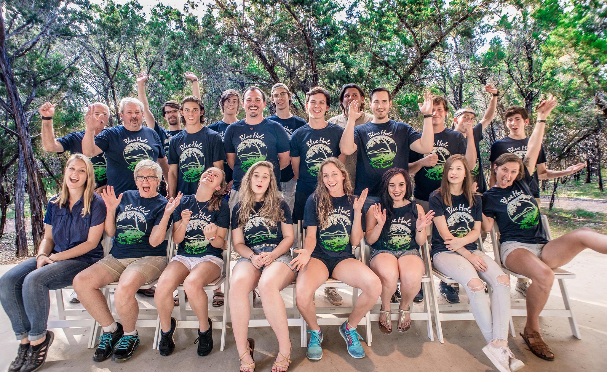 a group of people posing for a photo