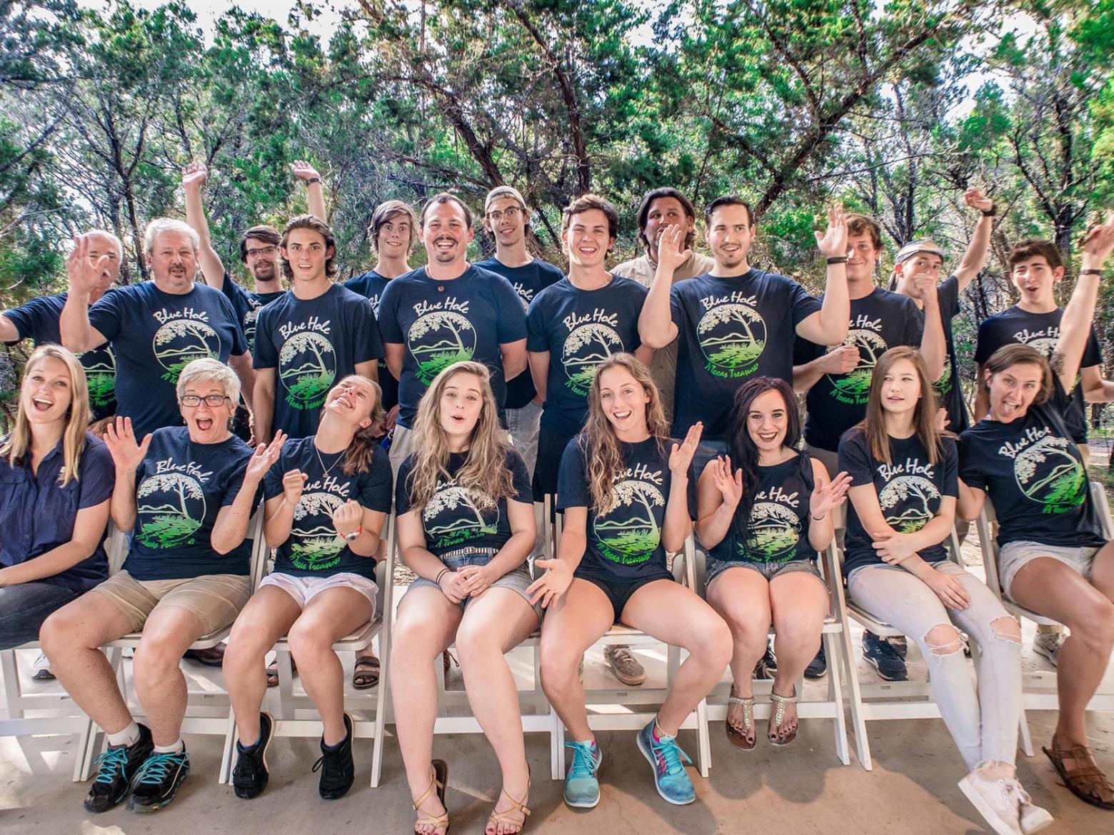 a group of people posing for a photo