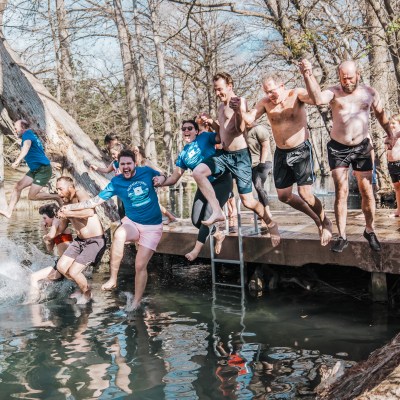 a group of people swimming in the water
