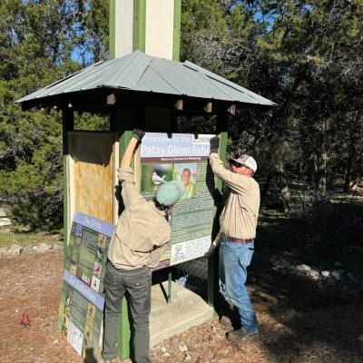 a person standing in front of a house