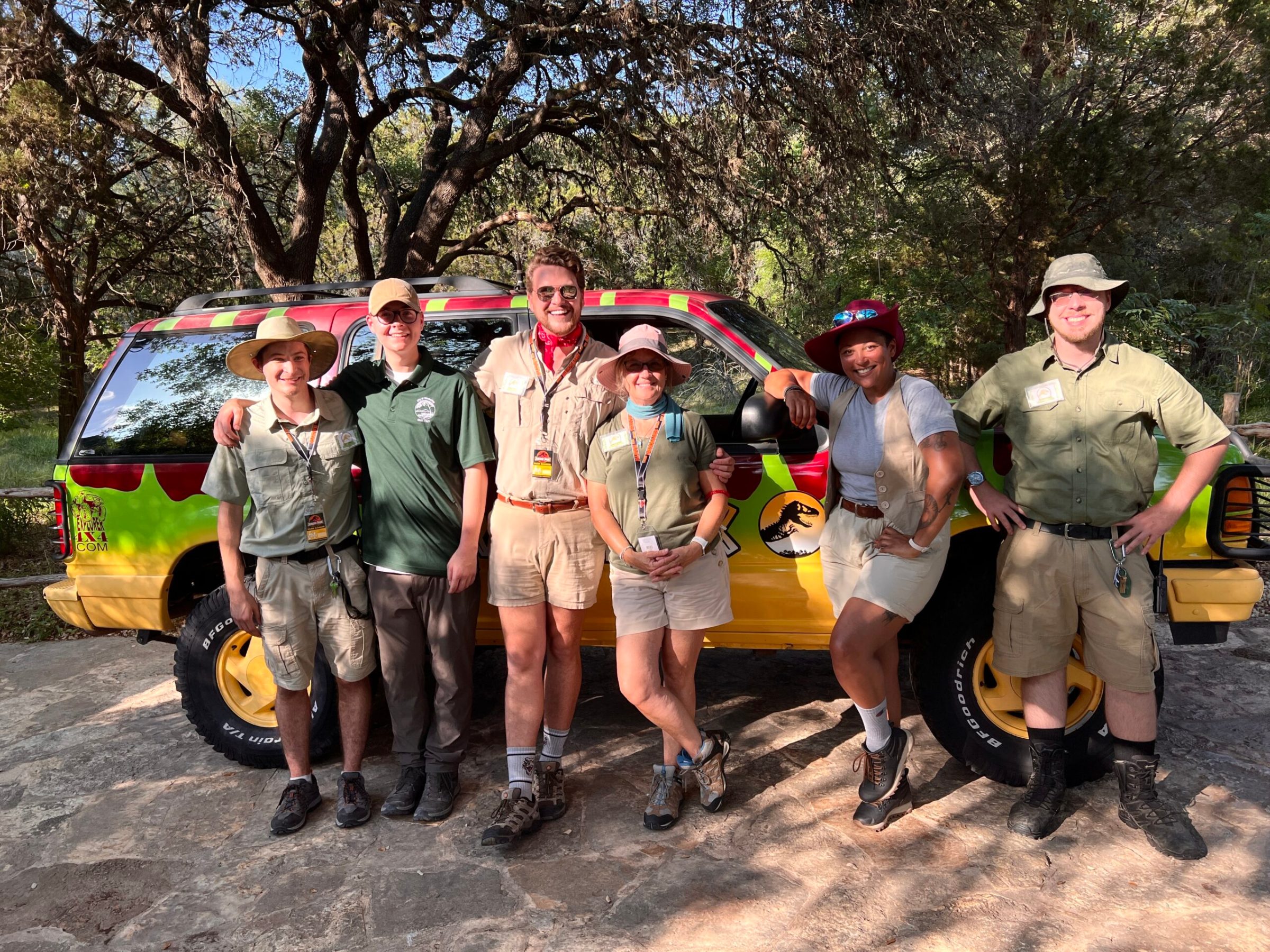 a group of people posing for the camera