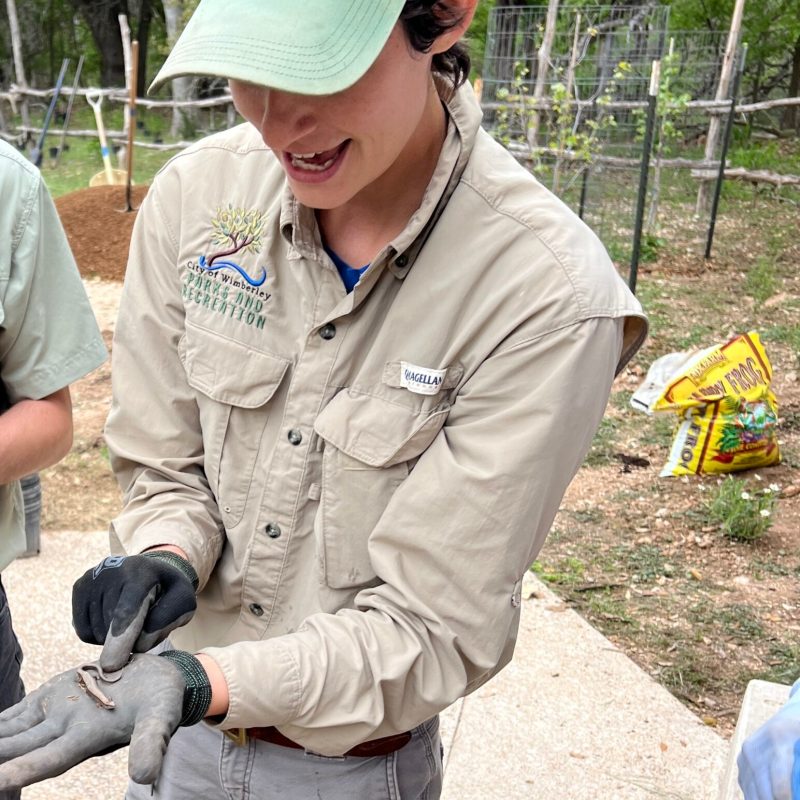 a group of people standing in a park