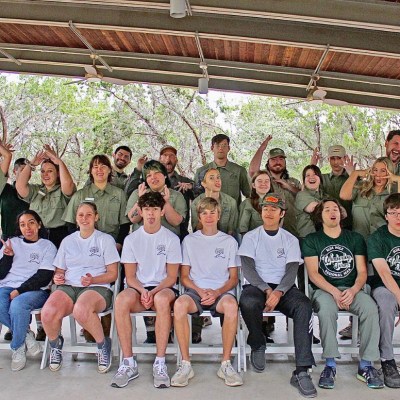 a group of people posing for a photo
