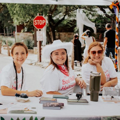 a group of people sitting at a table