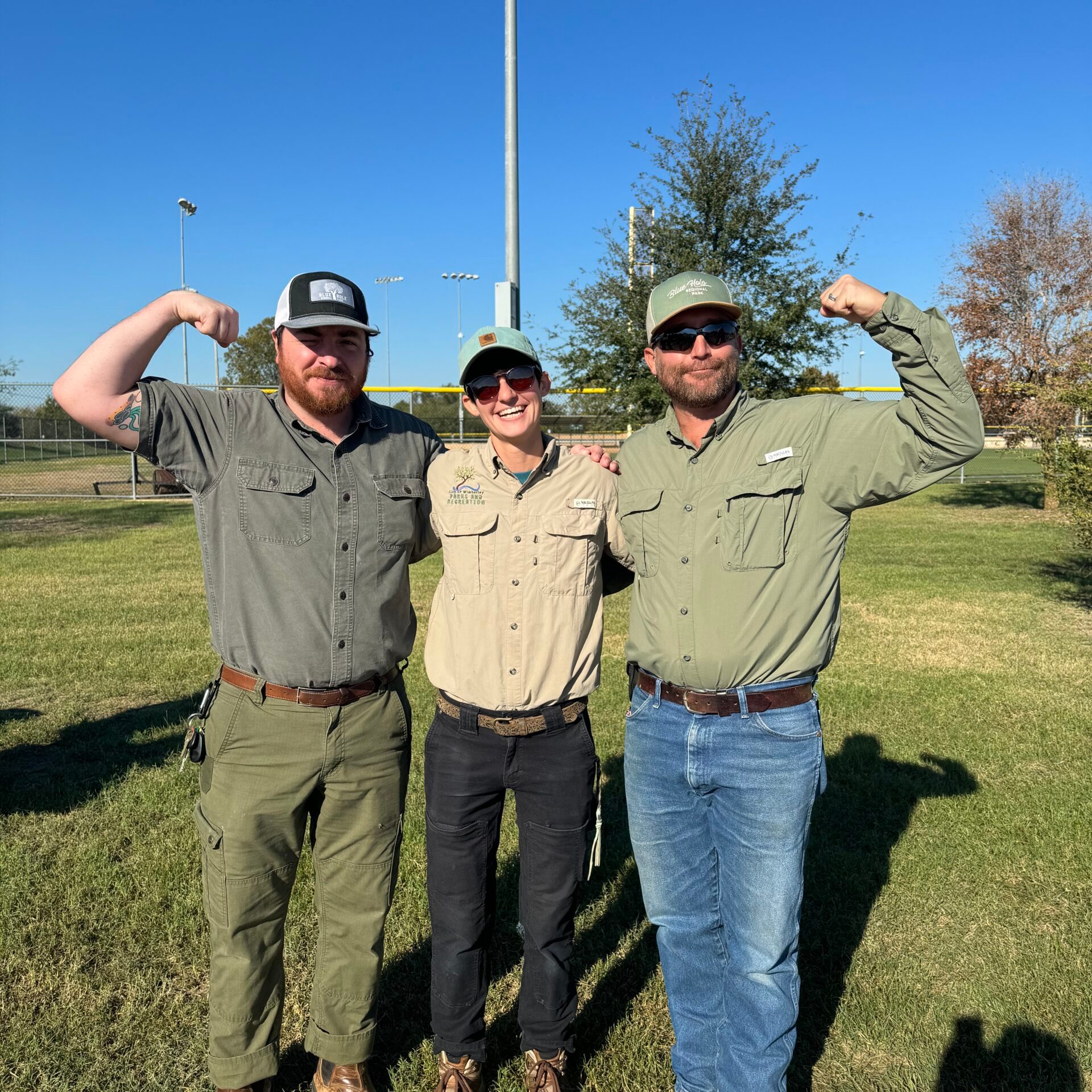 a group of people posing for the camera