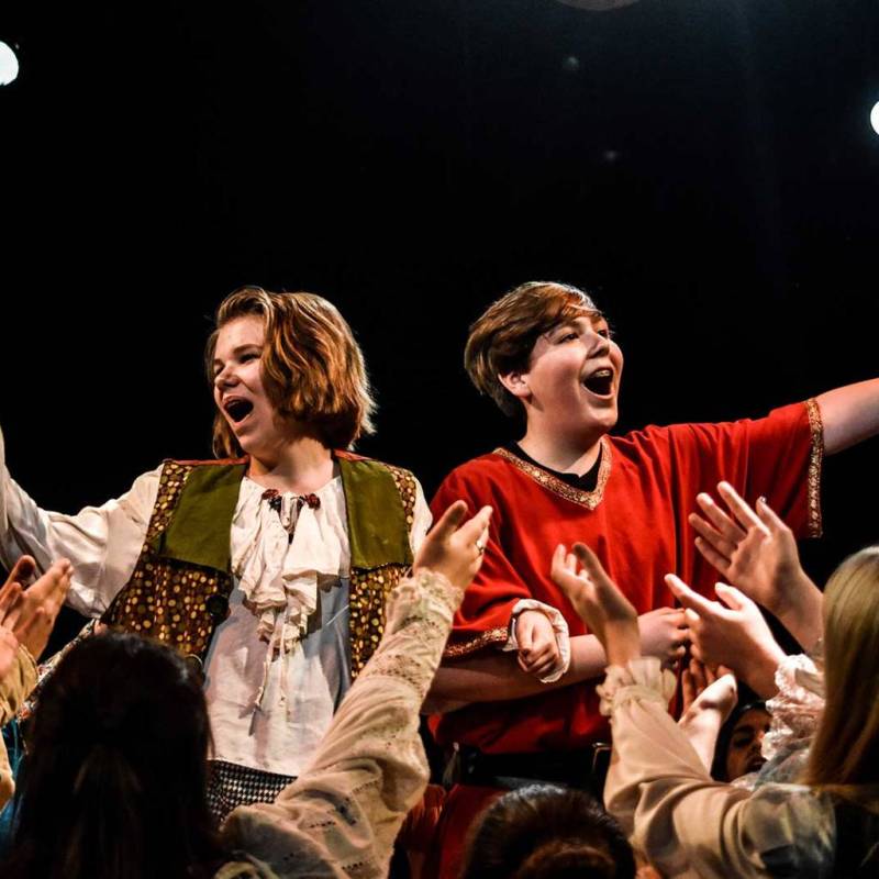 a group of people on a stage