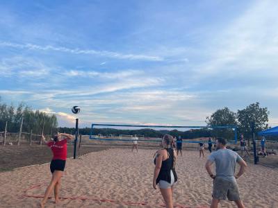 a group of people on a beach