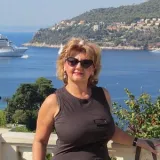 a person standing in front of a body of water