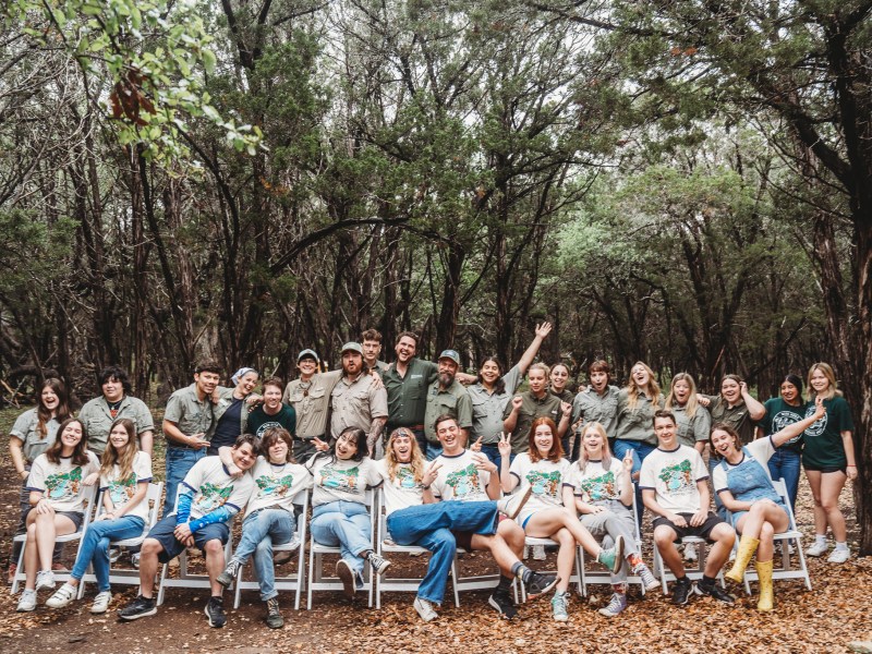a group of people posing for a picture