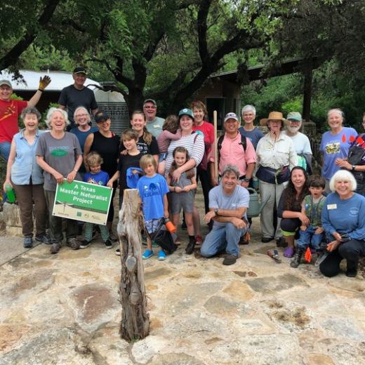 a group of people standing in front of a crowd