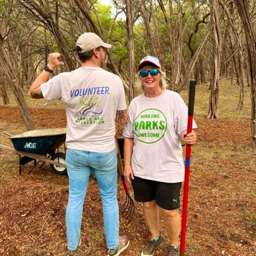 a group of people standing in a park