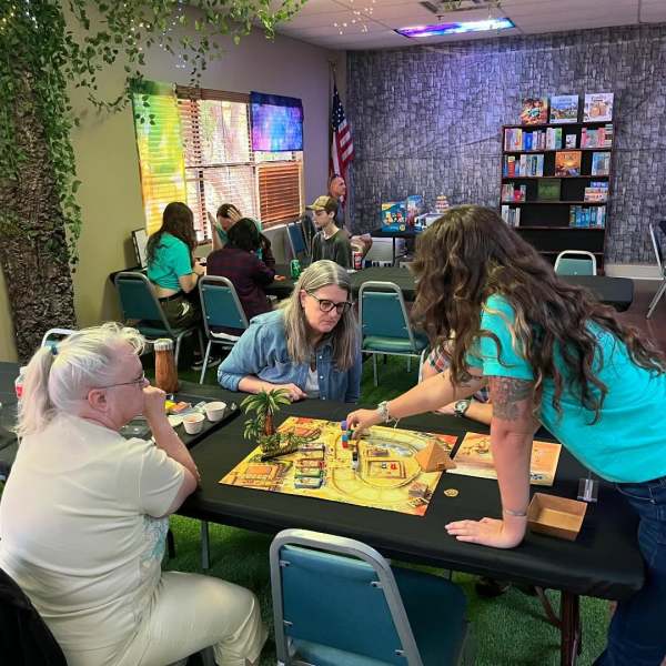 a group of people sitting at a table