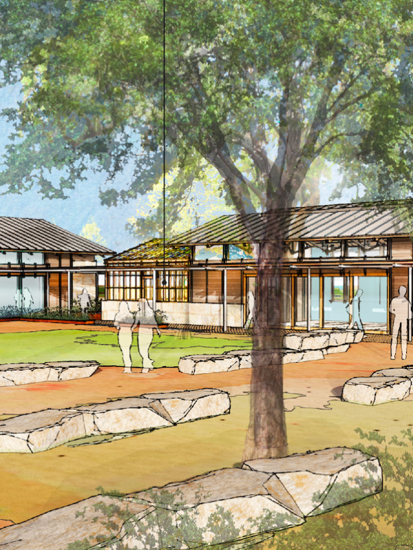 a group of people standing in a yard